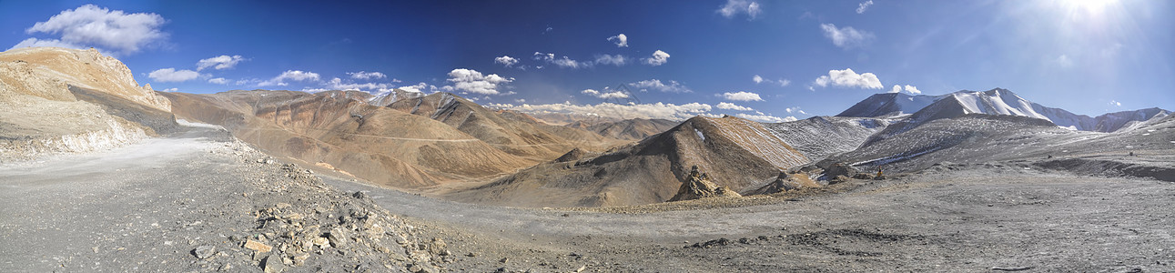 通往拉达赫的道路岩石水平地区全景远足山脉干旱风景蓝天太阳图片