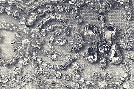 珍珠工艺美丽的蕾带工艺仪式订婚宏观魅力宝石新娘衣服婚礼水钻背景
