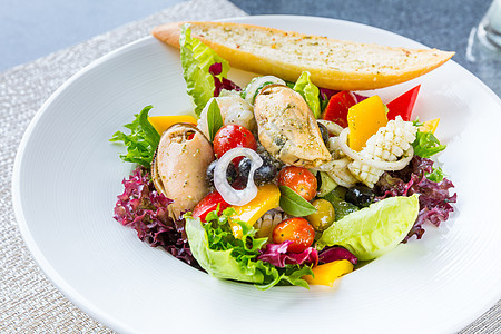 希腊海产食品沙拉草药食物盘子海鲜洋葱生菜餐巾美食绿色胡椒图片