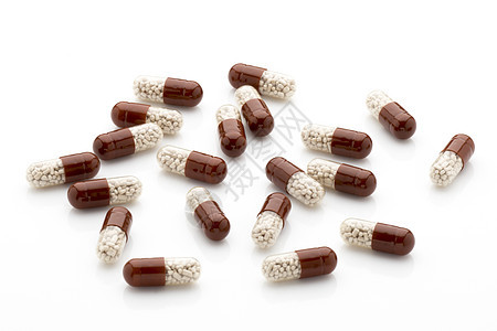 白底的抗生素胶囊健康药物处方草本药品保健宏观疾病白色棕色图片