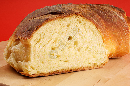 新鲜烤面包红色硬质小麦营养背景砧板背景图片