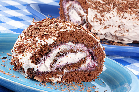 巧克力卷饼蛋糕盘子背景蛋糕食物奶油奶制品美食巧克力海绵甜点图片