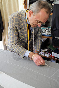 真正的裁缝定制手工男人模型工作男性磁带工具制作者工艺图片