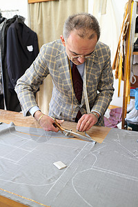 真正的裁缝店铺缝纫金子商业织物磁带剪裁男性材料男人图片