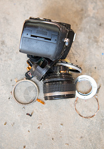 相机镜头破损摄影技术塑料镜片照片服务地面电子产品黑色玻璃图片