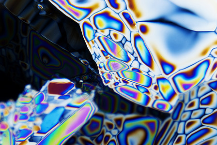 双极光线微晶晶体摄影矿物质极化宝石科学化学蓝色化学品彩虹显微镜图片