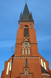 红砖塔教堂城市天空建筑红色建筑学宗教窗户图片