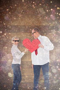 有着红心形状的情侣相亲情侣的综合形象感情太阳镜婚姻衬衫浅色桌子雪花紫色木头领带图片