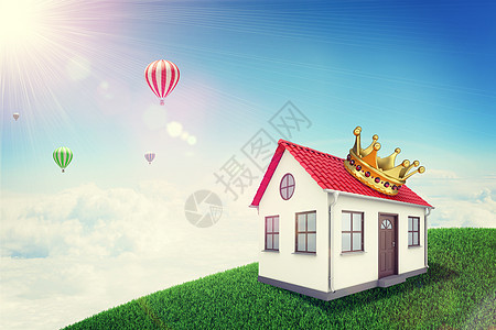 白房子有红色屋顶和绿色草地山上的皇冠 背景阳光明亮 热空气气球飞扬图片
