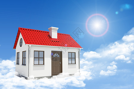 白房子有红色屋顶 棕色门和云雾烟囱 背景阳光明亮图片