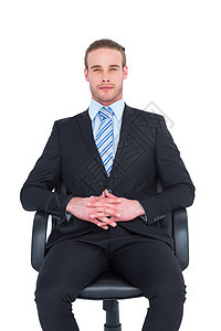 Stern 商务人士坐在办公椅上的办公椅上男性人士公司职业夹克棕色商业男人商务旋转图片