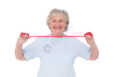 使用抗药带的老年妇女女性微笑竞技肌肉牵引运动快乐运动服护理锻炼图片
