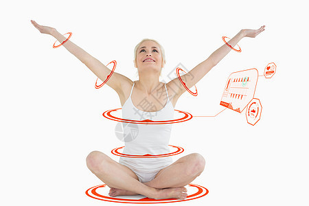 身手伸展的被绑在床上的年轻女性综合形象活动自由监控计算机运动服瑜伽计算体力健身房运动员图片