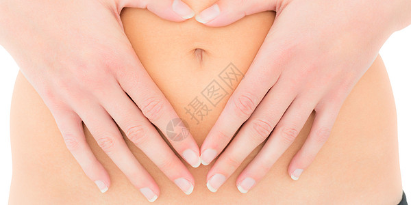 身体健康的妇女的中部腹部 手在肚子上图片