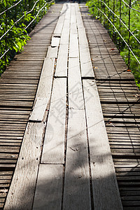 由木制的桥冒险人行道天桥荒野绳索旅游小路热带行人踪迹图片