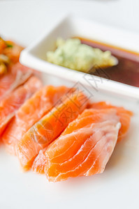 沙门生鱼红色橙子海鲜寿司鱼片文化牛扒白色美食食物图片