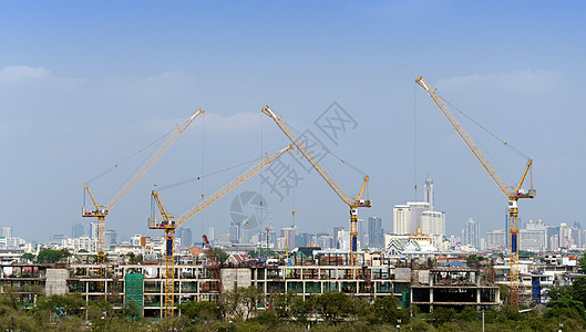 正在建造的建筑和起重机办公室天线城市水泥建筑学框架商业木板脚手架工程图片