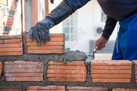 工人建造泥瓦工房屋房子水泥砖块男性建筑学砂浆石匠建设者工作工具图片