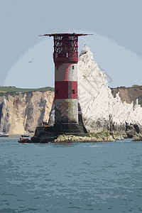 红色和白条纹灯塔 在针头在宁静的船舶船运房子导航悬崖小岛粉笔海洋海岸线地标图片