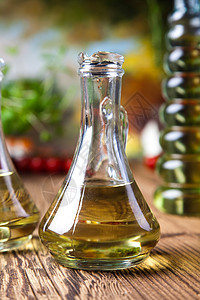 橄榄油 外维尔京 地中海农村主题叶子蔬菜木头食物玻璃油壶美食烹饪宏观营养图片