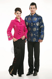 白色背景面前穿着中国服装服务员的服饰旗袍职员戏服职业棉袄女孩围裙餐厅迎宾服务背景图片