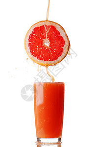 橙汁从橙汁中涌出营养橙子流动溪流玻璃红色柚子水果白色饮料图片