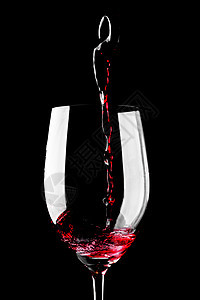 红酒灌注红色酒杯高脚杯黑色运动美食玻璃液体酒精瓶子图片