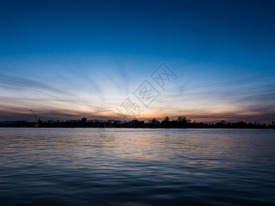 日落在里加的道格瓦河上日出反射天空太阳场景中心首都兄弟景观全景图片