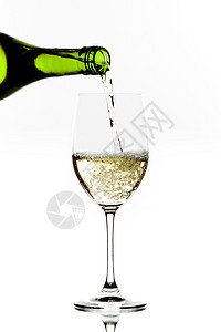 白葡萄酒倾注流动瓶子白色高脚杯液体美食酒精酒杯溪流玻璃图片
