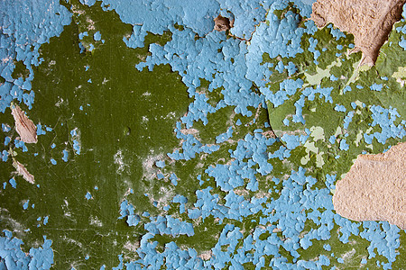 破碎的蓝色和绿色涂料有丰富纹理的旧墙建造裂痕裂缝砂浆风化建筑建筑学石膏材料缺口图片