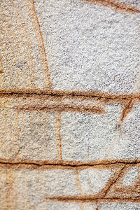 砂岩表面建筑学粒状石墙墙纸棕褐色石头材料建筑矿物学石英图片