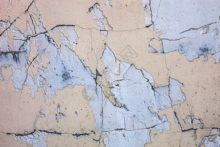 含沙砂油漆残渣的碎裂混凝土表面岩石材料石头石墙地面水泥风化石膏棕褐色裂缝图片