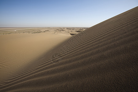 沙漠沙丘 美妙饱和的旅行主题晴天红色土地气候太阳干旱阴影橙子风景荒野图片