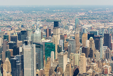 曼哈顿市中心的空中天线在阳光明媚的一天 New蓝色直升机建筑学帝国全景天际城市景观摄影摩天大楼图片