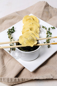 美味的子小吃咖啡房子餐厅筷子煮沸桌布烹饪点心面团图片