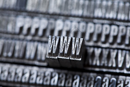混合了老式纸质打印字符金属字母机器机械活版工具长方形印刷厂文学平方图片