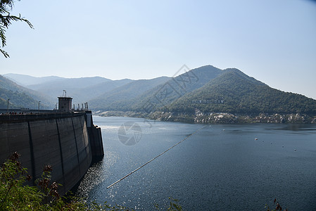 水坝电力发电发电机堤防场景建筑天空活力旅行堆石流动水库大堤图片