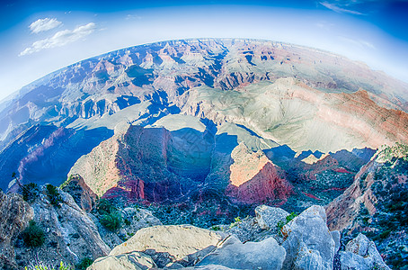 大峡谷阳光明媚 天空晴蓝旅游地质学沙漠侵蚀橙子旅行公园荒野国家明信片图片