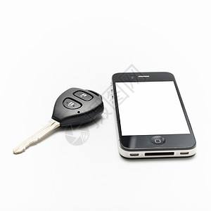 有智能电话的车用钥匙口袋木头屏幕技术展示引擎手机桌子图片