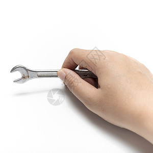 手握扳手工作服务手指硬件维修机器工具金属机械工业图片
