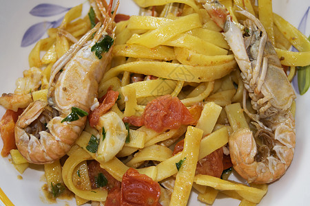 意大利细面条贝类盘子食物美食海鲜对虾烹饪蔬菜图片