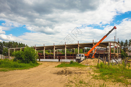 正在建造的建筑构造地面天空建筑学工作起重机工业卡车工程光束背景图片