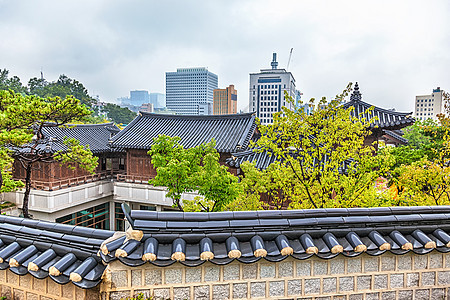 传统古老和现代韩国住房城市风景古董建筑学天空文化绿色景观建筑房子背景图片