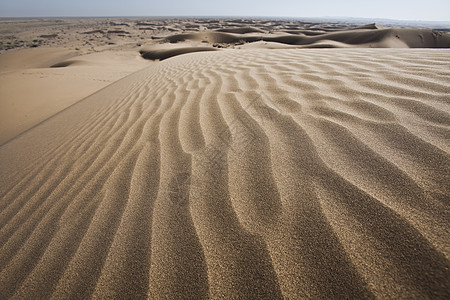 Dunes 美妙饱和的旅行主题晴天沙漠阴影荒野橙子风景气候红色丘陵太阳图片