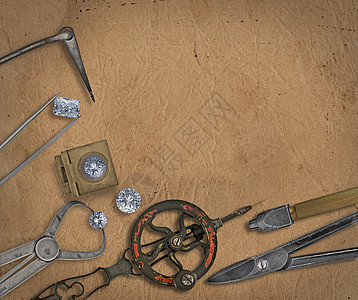 古老的珠宝工具及钻石工作桌子钻头工艺金子金匠圆形木头镊子制造业图片