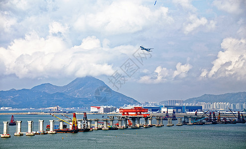 香港澳门大桥兴海建筑工地戏剧性蓝色天空车辆天际交通踪迹飞机运输汽车图片