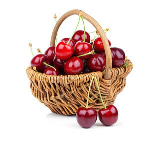 白色背景的一篮子新鲜红樱桃木头饮食绿色甜点红色叶子水果关键字柳条浆果图片