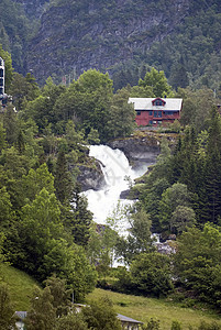 旅游度假和旅行 卑尔根 挪威 斯堪的纳维亚半岛的山脉和瀑布悬崖风景峡湾岩石绿色火焰图片