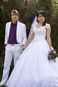 新郎和新郎结婚之日快乐的年轻新娘幸福丈夫套装男性婚姻成人裙子仪式婚礼面纱图片