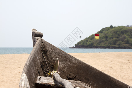 印度果阿岛印度沙滩上的老鱼船场景热带海岸线海滩旅行情调地平线蓝色太阳海岸图片